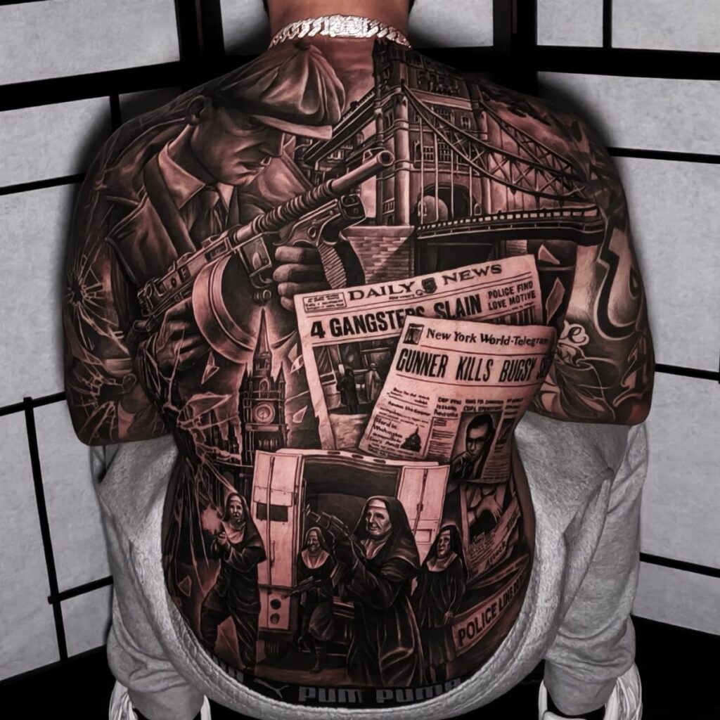 Detailed black and grey back piece tattoo depicting a gangster and urban crime scenes.